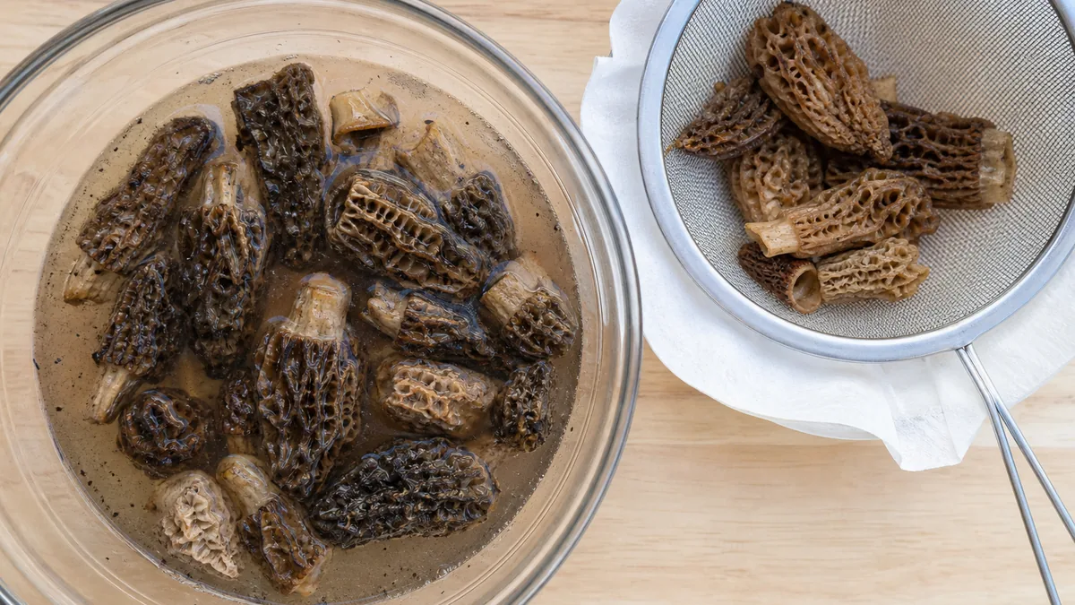 Dried morels soaking in a bowl before straining - morel substitute